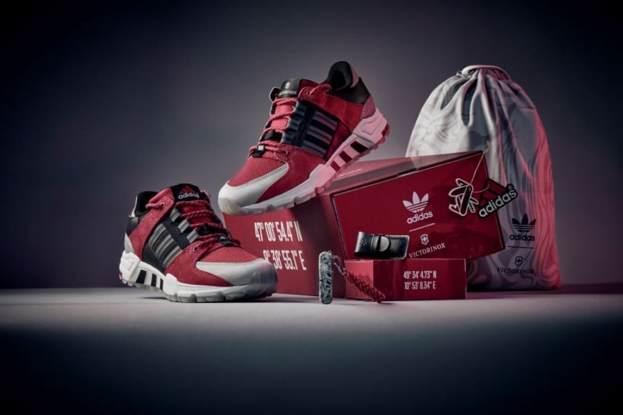 adidas shoes in red with a swiss army knife featuring damascus patterned steel - shoes come with collectible box and gym bag.