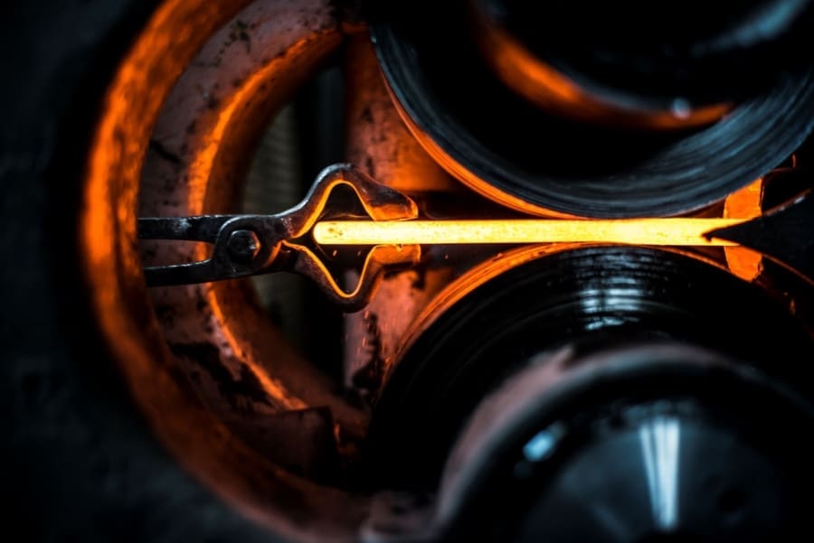 A piece of hot steel in the rollingmill, damasteel