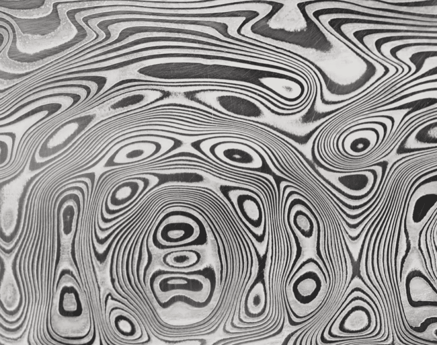 Damasteel DS93X pattern Grosserosen, etched damascus steel close-up
